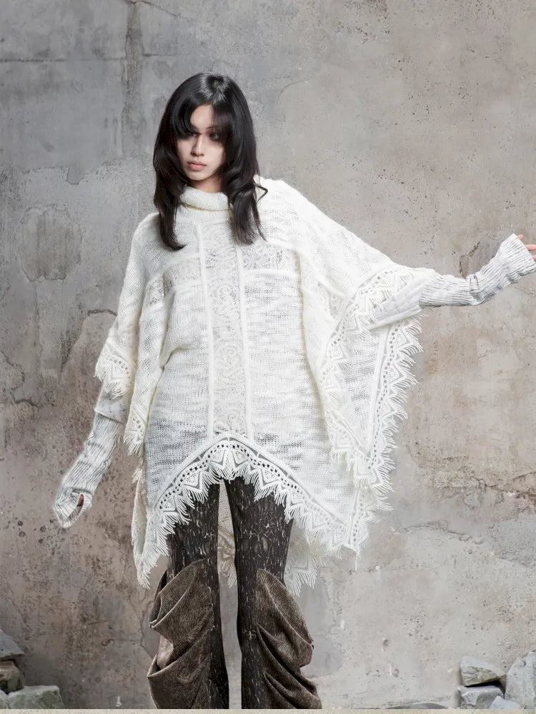 Asymmetrical fringe detailing on a niche knit top【s0000014136】