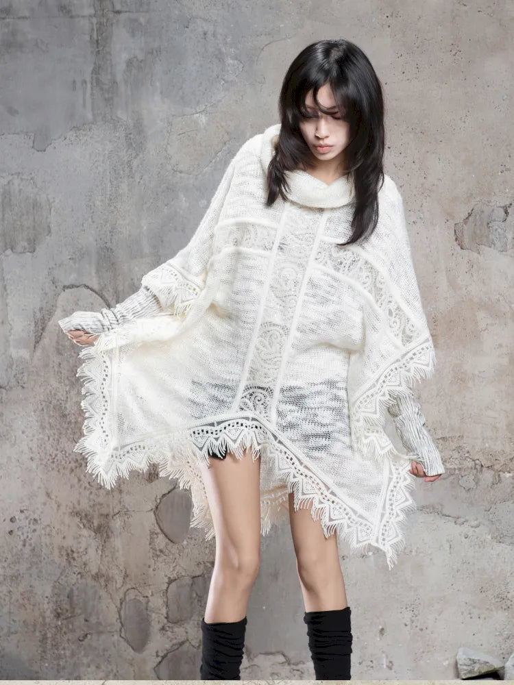 Asymmetrical fringe detailing on a niche knit top【s0000014136】