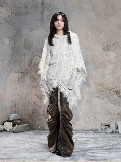 Asymmetrical fringe detailing on a niche knit top【s0000014136】