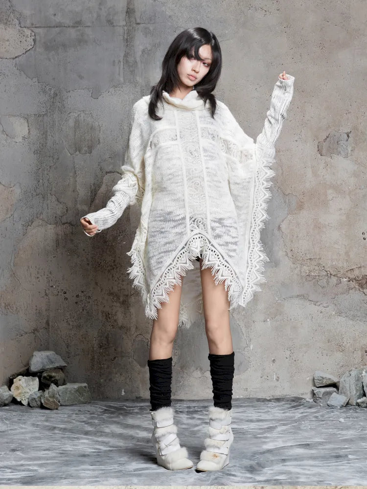 Asymmetrical fringe detailing on a niche knit top【s0000014136】